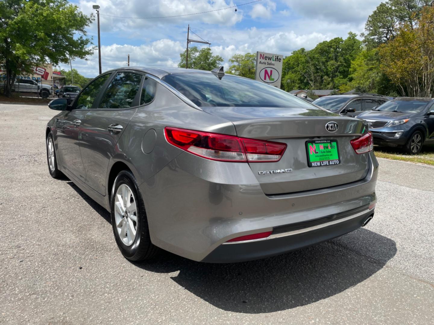 2018 GRAY KIA OPTIMA LX (5XXGT4L34JG) with an 2.4L engine, Automatic transmission, located at 5103 Dorchester Rd., Charleston, SC, 29418-5607, (843) 767-1122, 36.245171, -115.228050 - Roomy Interior with AUX/USB/Sat/Bluetooth, Power Windows, Power Locks, Power Mirrors, Backup Camera, Keyless Entry, Alloy Wheels. 118k miles Located at New Life Auto Sales! 2023 WINNER for Post & Courier's Charleston's Choice Pre-owned Car Dealer AND 2018-2024 Top 5 Finalist for Charleston City Pap - Photo#4